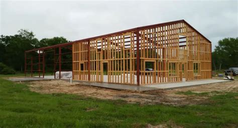 can lumber and metal build houses|wooden frame vs metal barndominium.